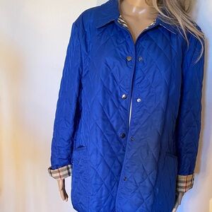 Burberry outdoor jacket with front pockets and snaps , size XL